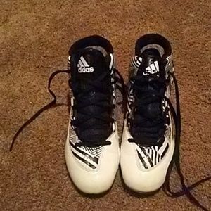 Gently used football cleats